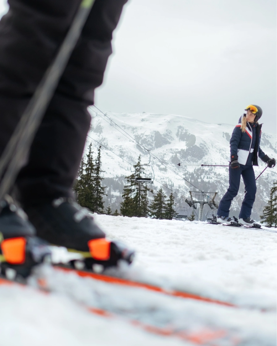 Skis and peson in the background
