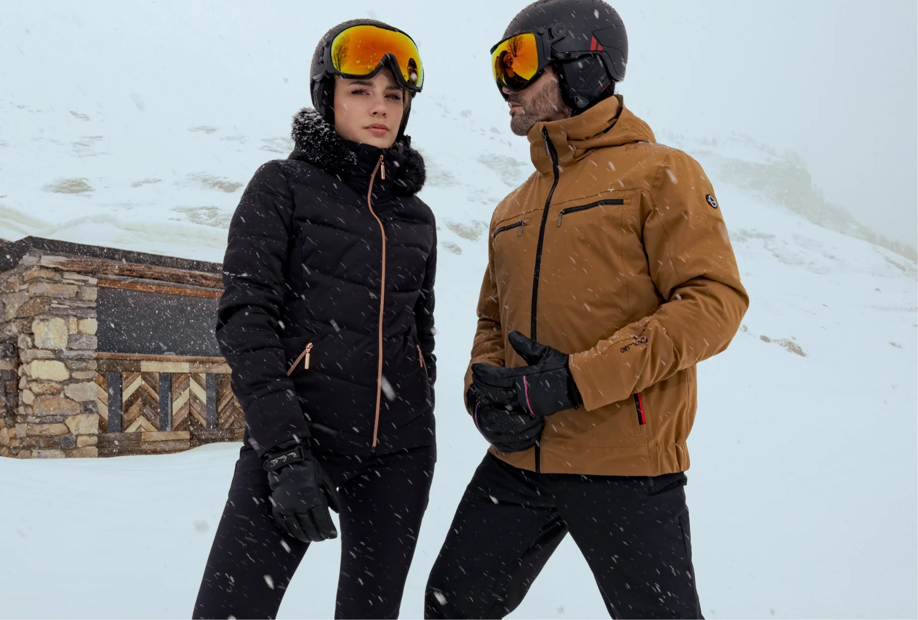 Couple in the snow in skiwear