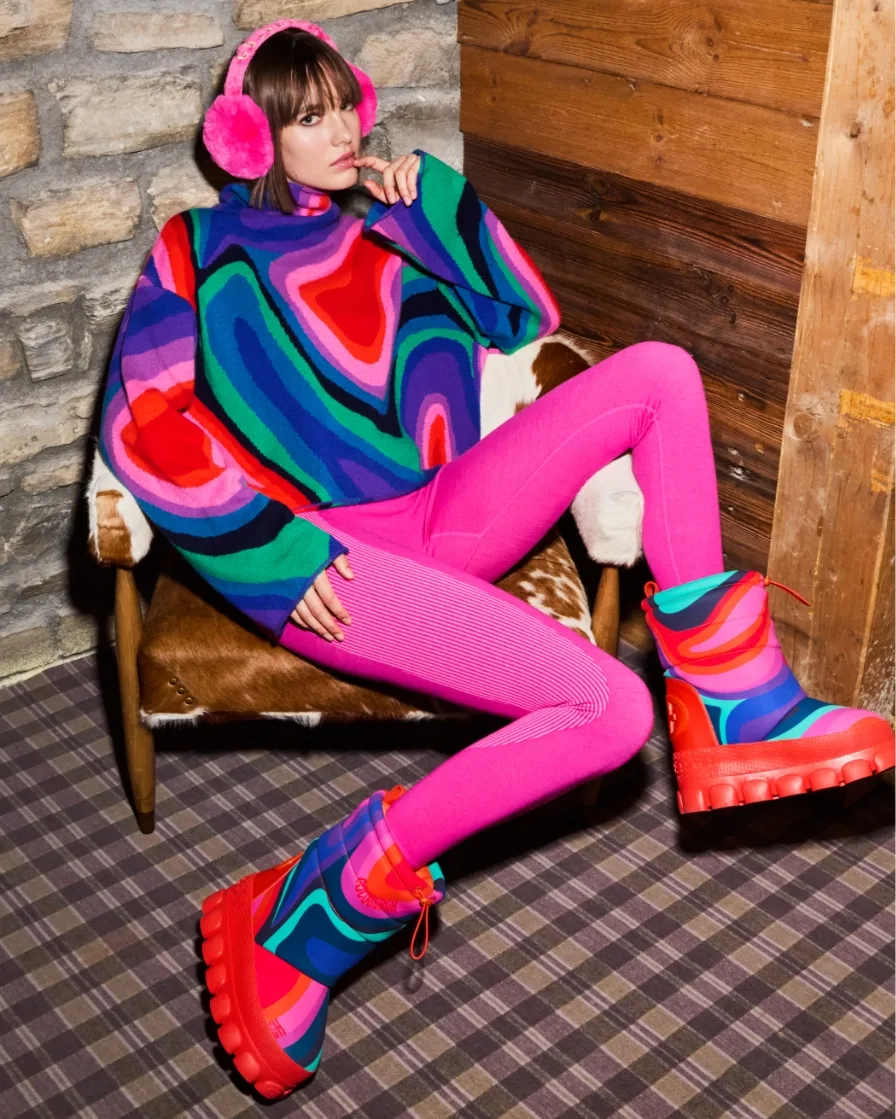Woman in bright skiwear