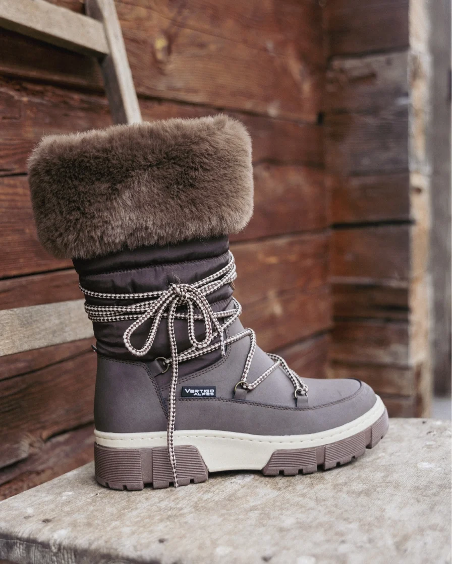 Brown boots on table