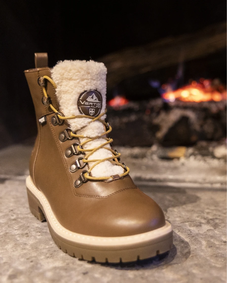Brown boot in front of fire